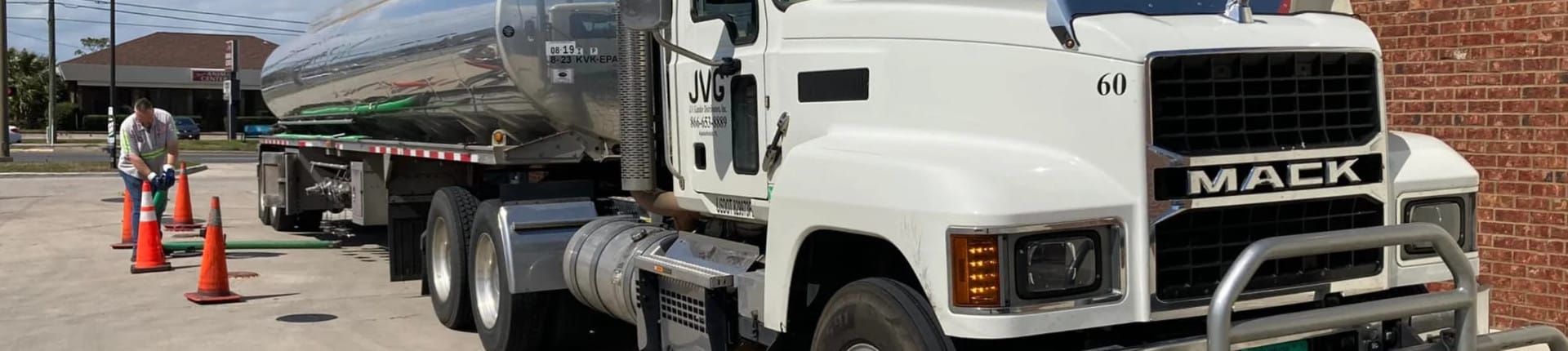 J.V. Gander filling tanks at Panama City Florida gas station J.V. Gander filling tanks at Panama City Florida gas station